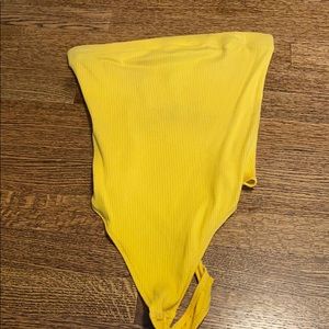 Out from under mustard strapless bodysuit